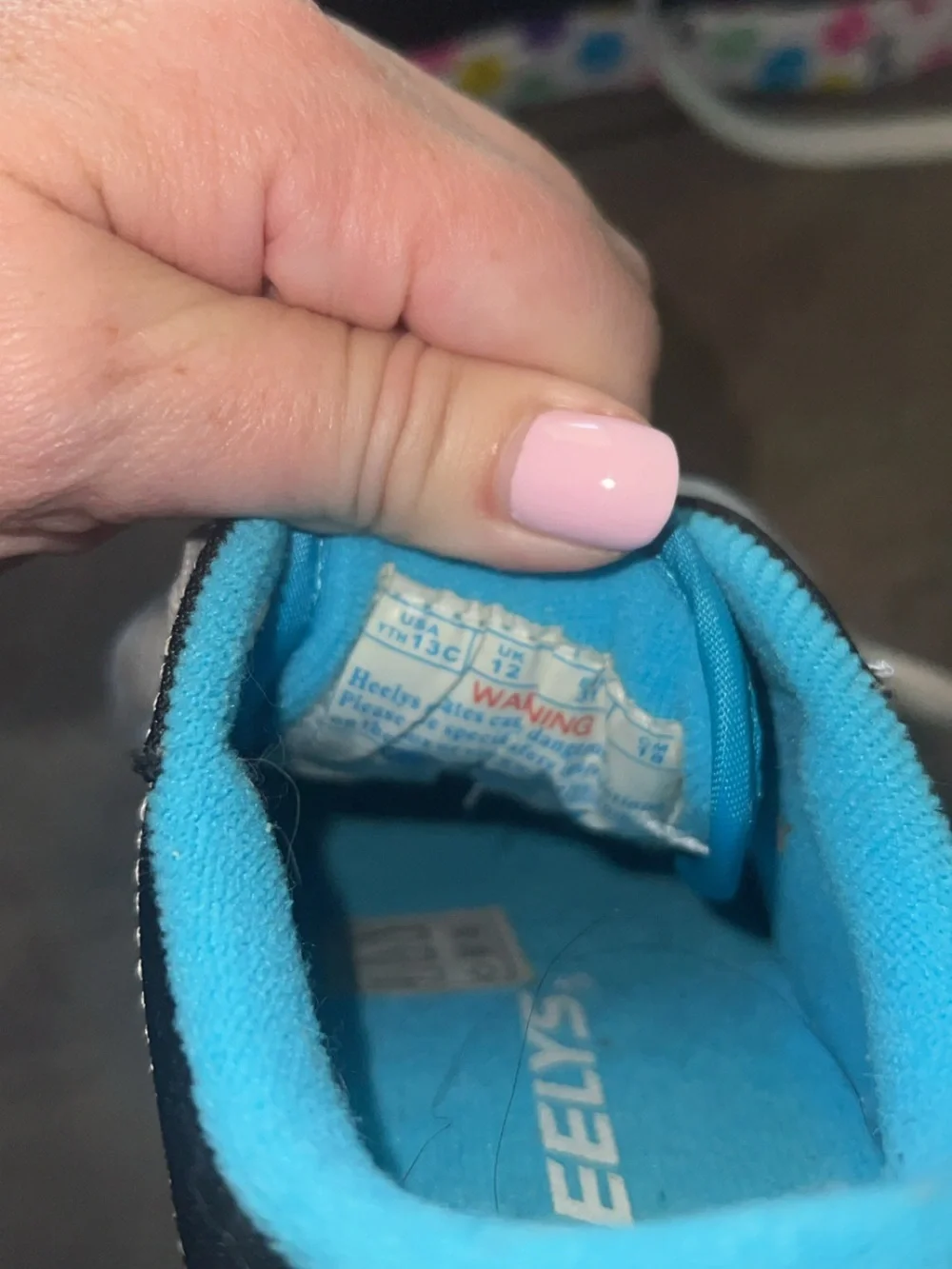 Heelys Kids' Black Canvas Sneakers with Blue Lining and Colorful Smiley Trim